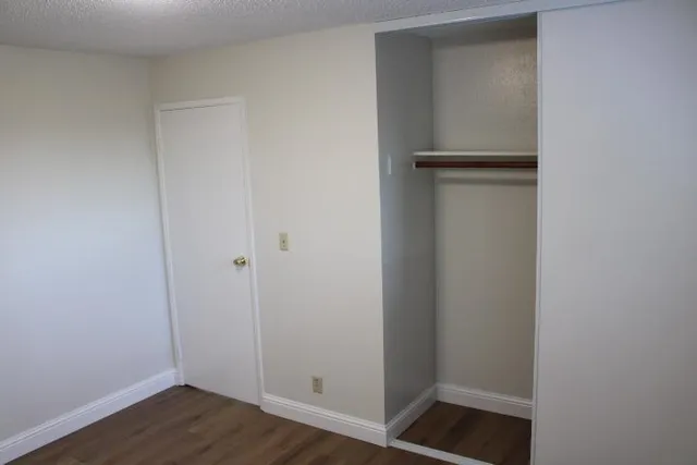 a view of small space with wooden floor