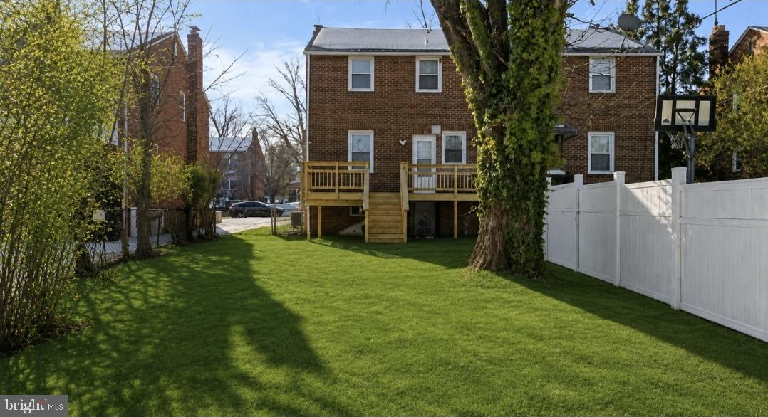 5102 Plymouth Road Baltimore, MD 21214 - Photo 2 of 32 a view of an house with backyard space and garden