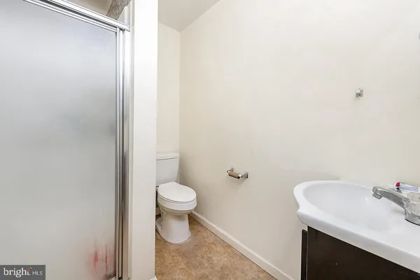 a bathroom with a sink and a toilet