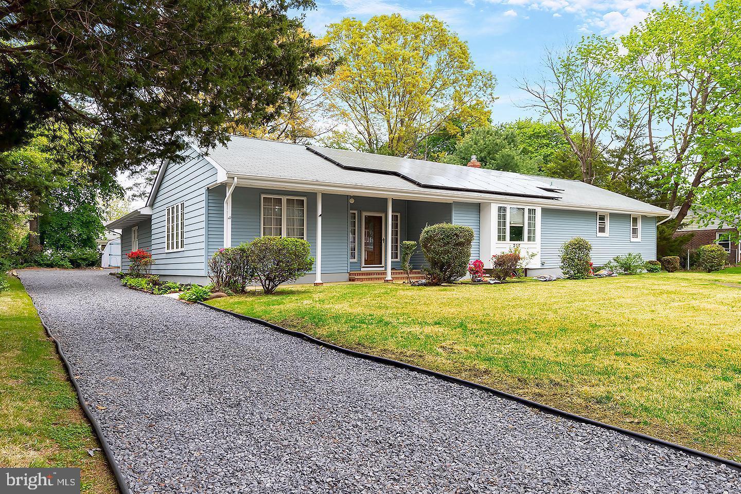217 University Boulevard Glassboro, NJ 08028 - Photo 2 of 23 a front view of house with yard and green space