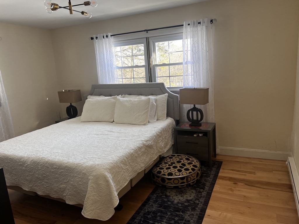 635 Florence Road Northampton, MA 01062 - Photo 11 of 19 a bedroom with a bed and a window