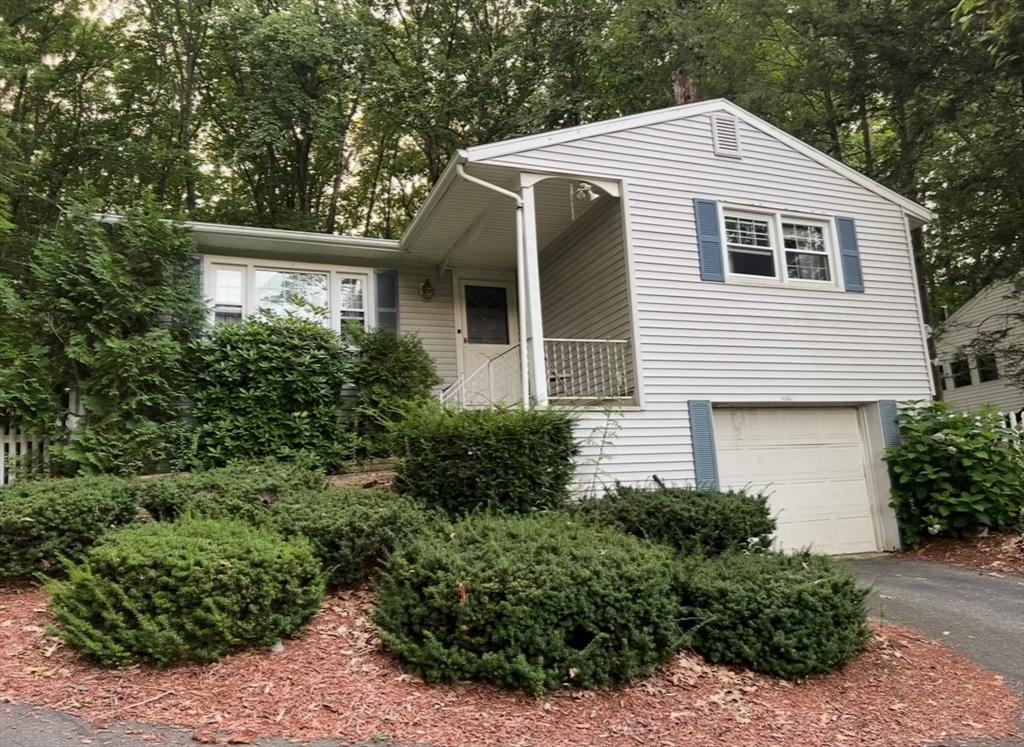 635 Florence Road Northampton, MA 01062 - Photo 16 of 19 a front view of a house with a yard