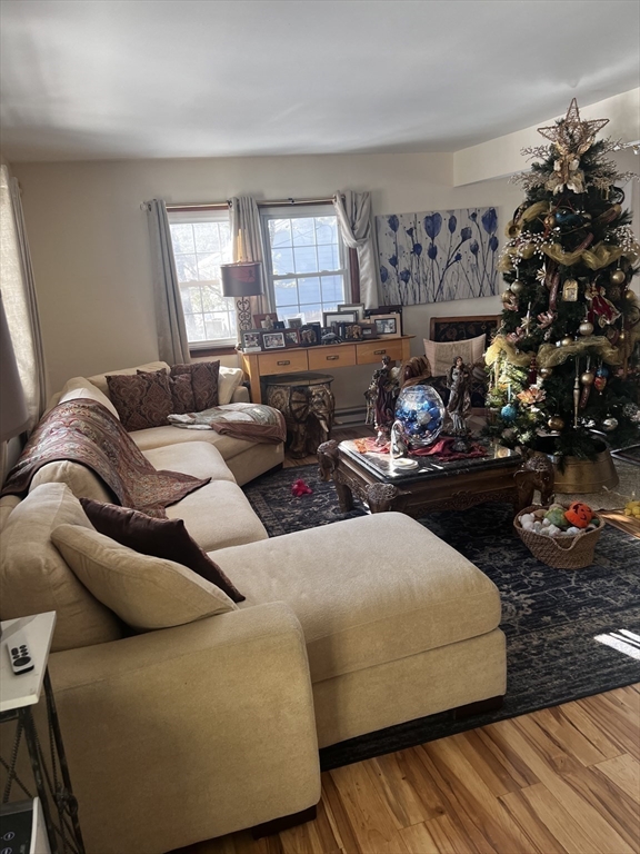 635 Florence Road Northampton, MA 01062 - Photo 8 of 19 a living room with furniture and a large window