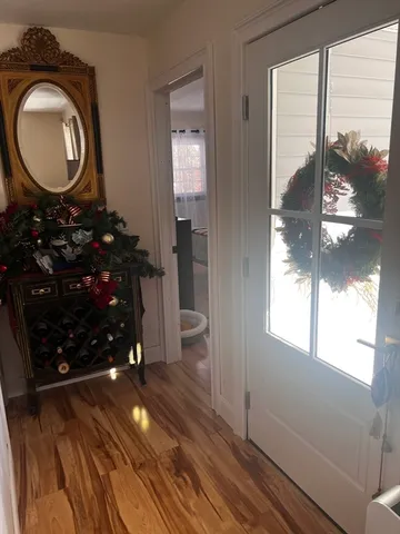 a bathroom with a mirror and a sink