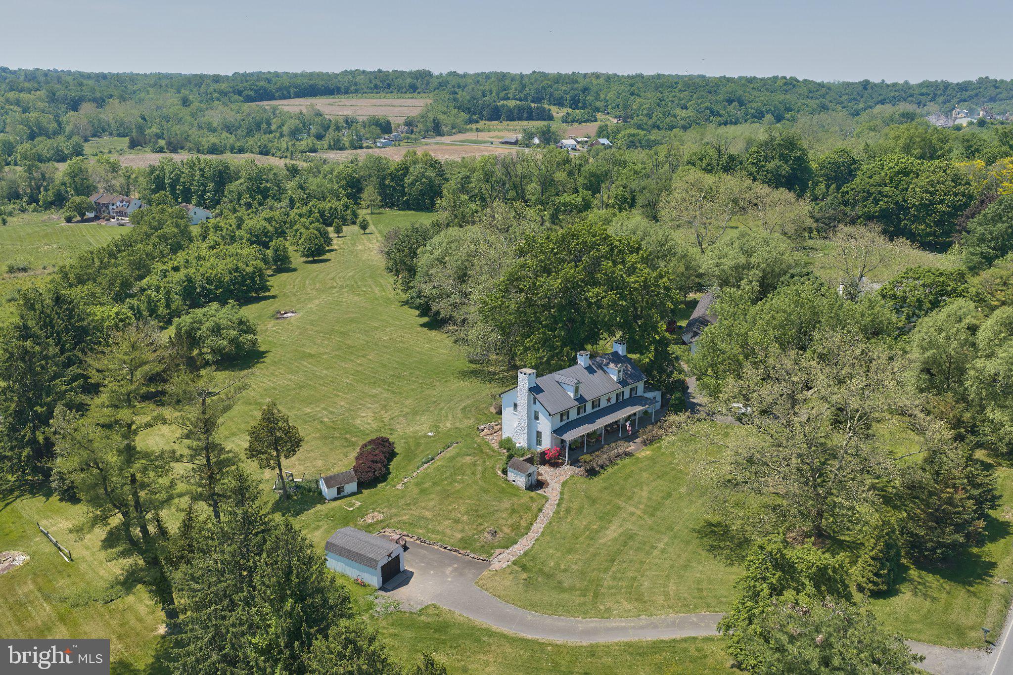 765 Swamp Road Newtown, PA 18940 - Photo 34 of 37 an aerial view of a house with a yard