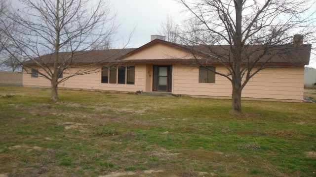 85025 March Road Milton Freewater, OR 97862 - Photo 1 of 1 a front view of a house with garden
