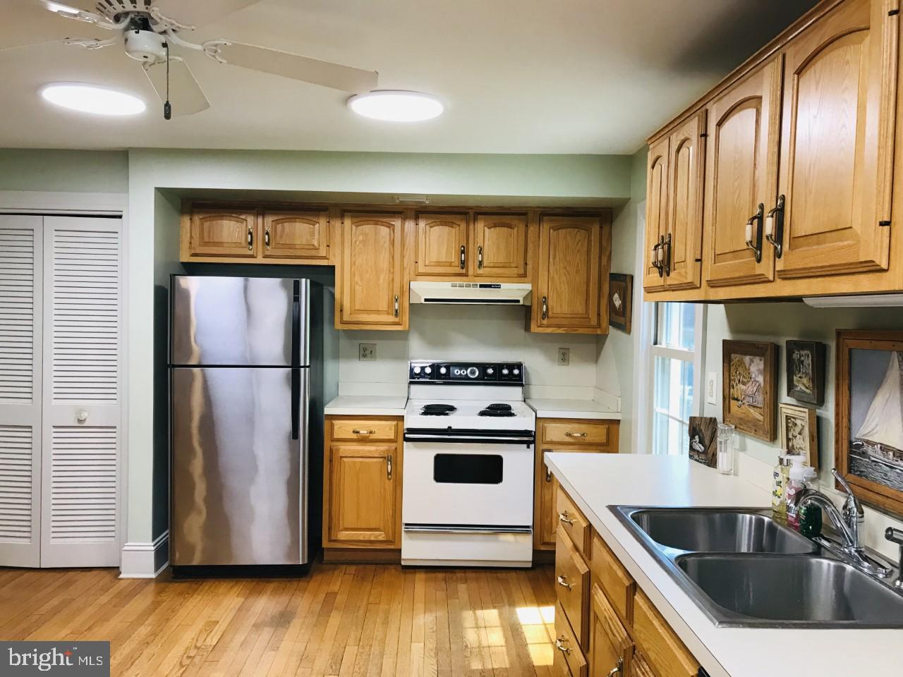 1129 Riverside Drive Salisbury, MD 21801 - Photo 12 of 44 Kitchen has Numerous Cabinets and a Large Pantry