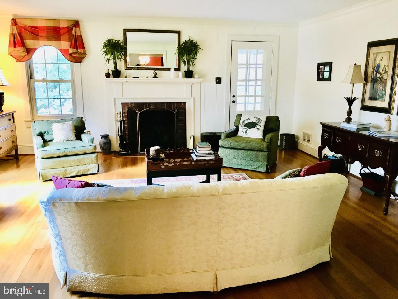 Living Room has a Gas Fireplace door to Porch