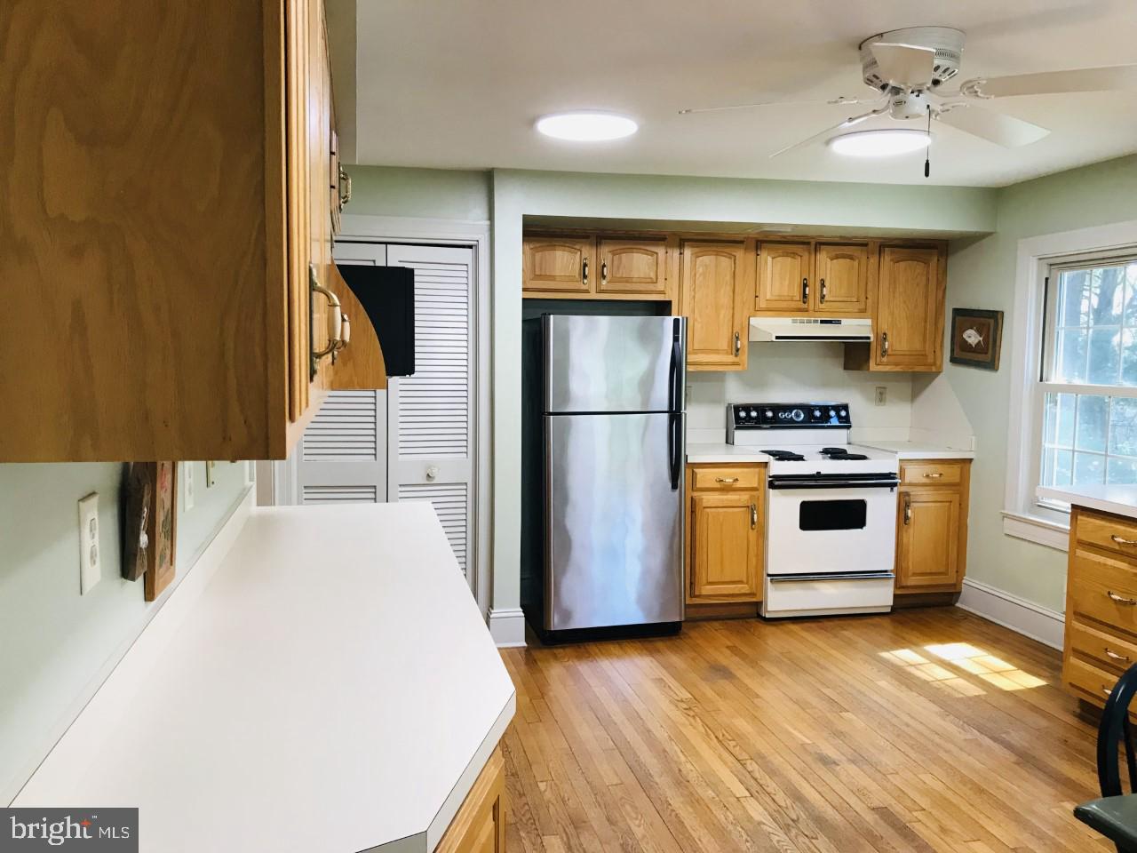 1129 Riverside Drive Salisbury, MD 21801 - Photo 10 of 44 Kitchen has Oak Cabinets and Hardwood Floors