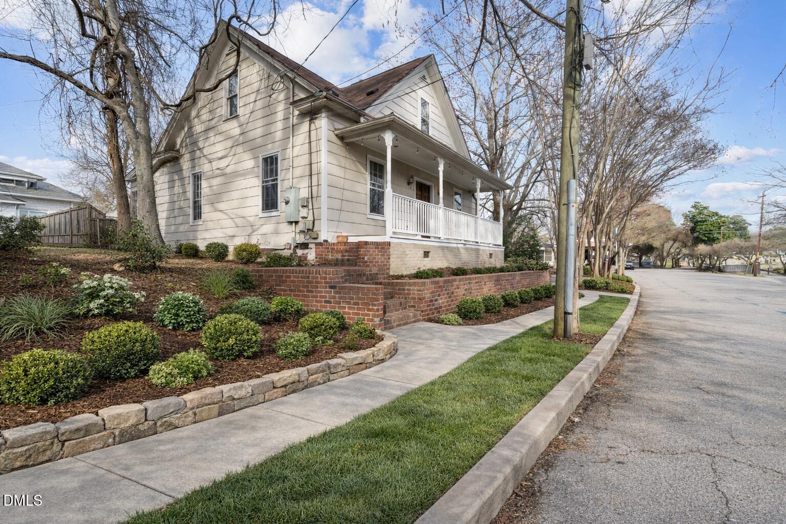 405 Morson Street Raleigh, NC 27601 - Photo 1 of 19 Charming corner house with lush landscap
