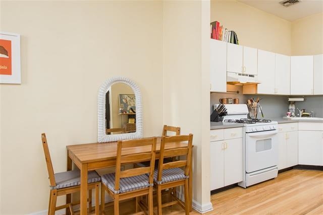 222 Clinton Street, Unit 21 Hoboken, NJ 07030 - Photo 4 of 9 a dining room with furniture and wooden floor