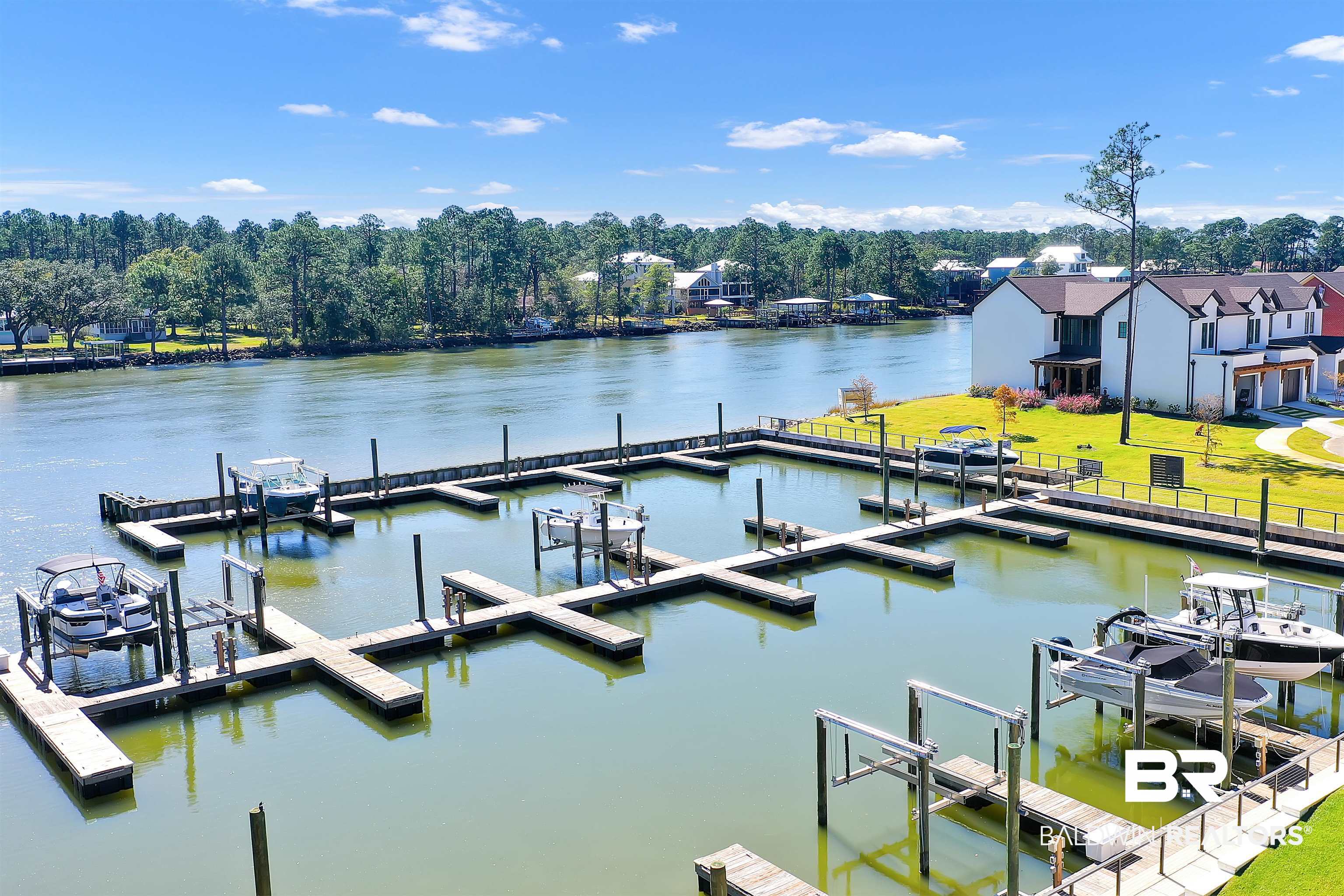 885 Inlet Circle Gulf Shores, AL 36542 - Photo 34 of 36 Dock area with a lawn and a water view
