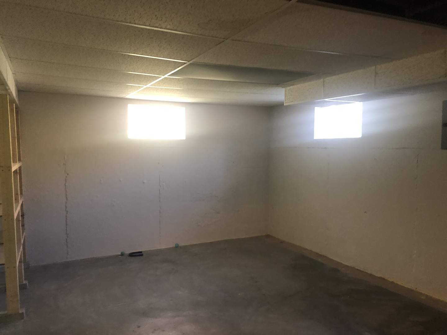 296 East Quincy Street Riverside, IL 60546 - Photo 14 of 17 a view of an empty room and a window