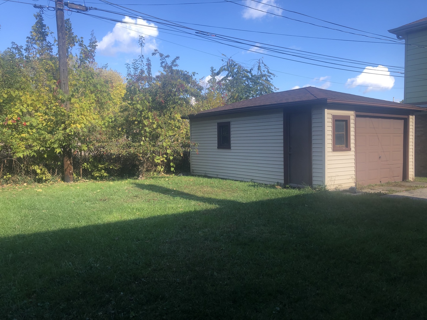 296 East Quincy Street Riverside, IL 60546 - Photo 17 of 17 a view of a house with a yard