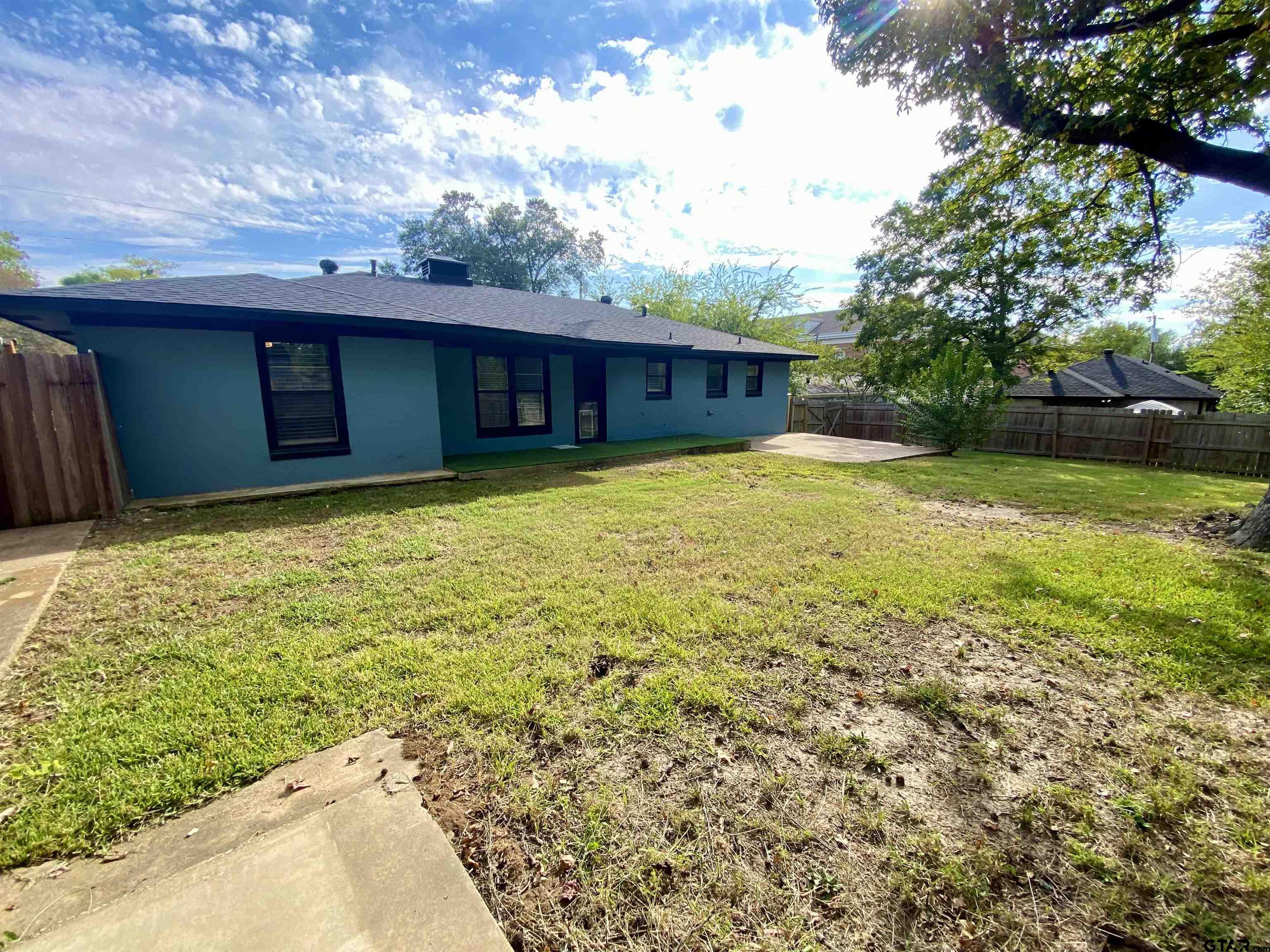 1914 Parklen Street Tyler, TX 75701 - Photo 37 of 39 a view of a house with a yard