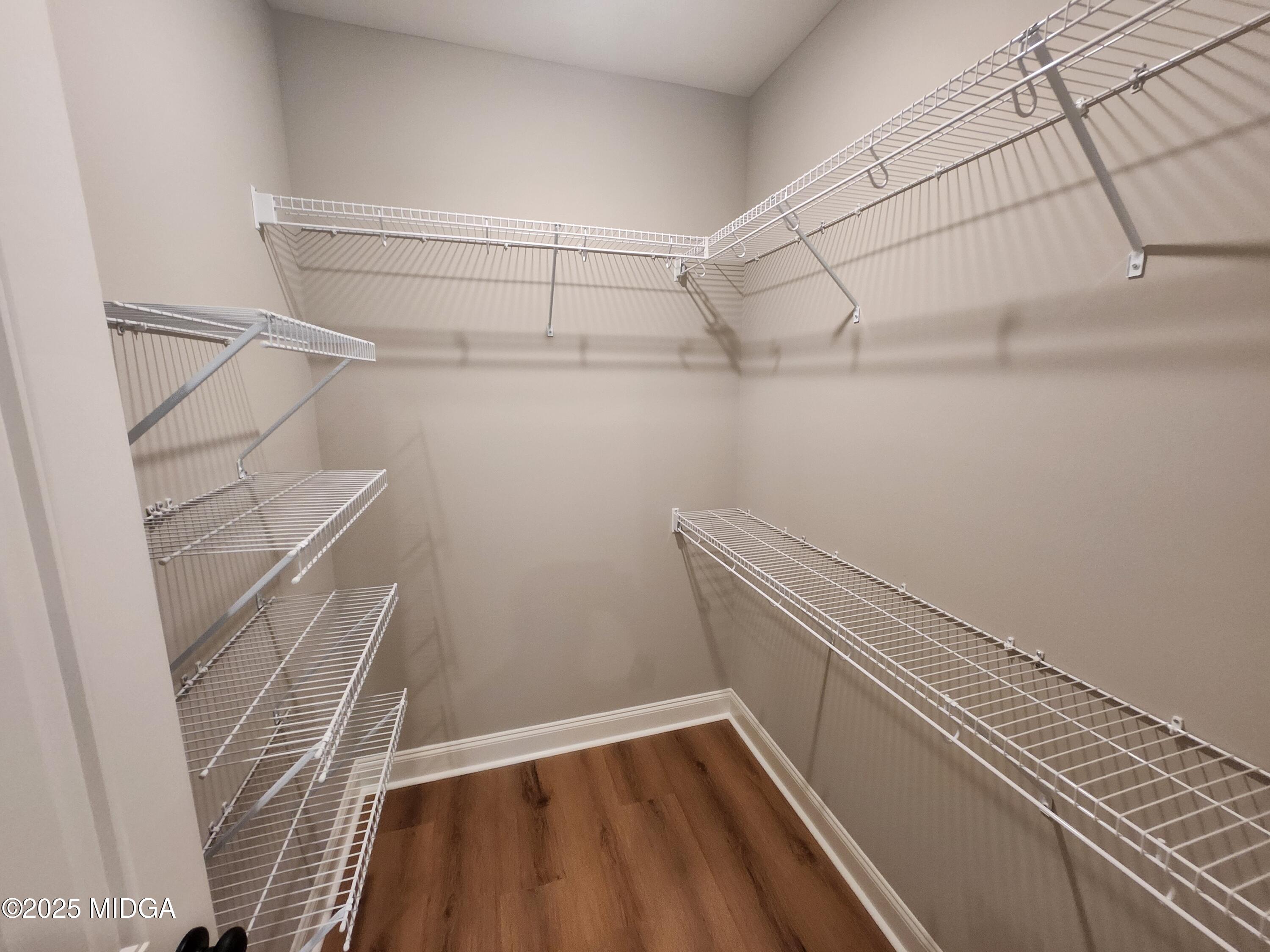 404 Minter Drive Warner Robins, GA 31088 - Photo 35 of 60 a view of a room with racks on the wall