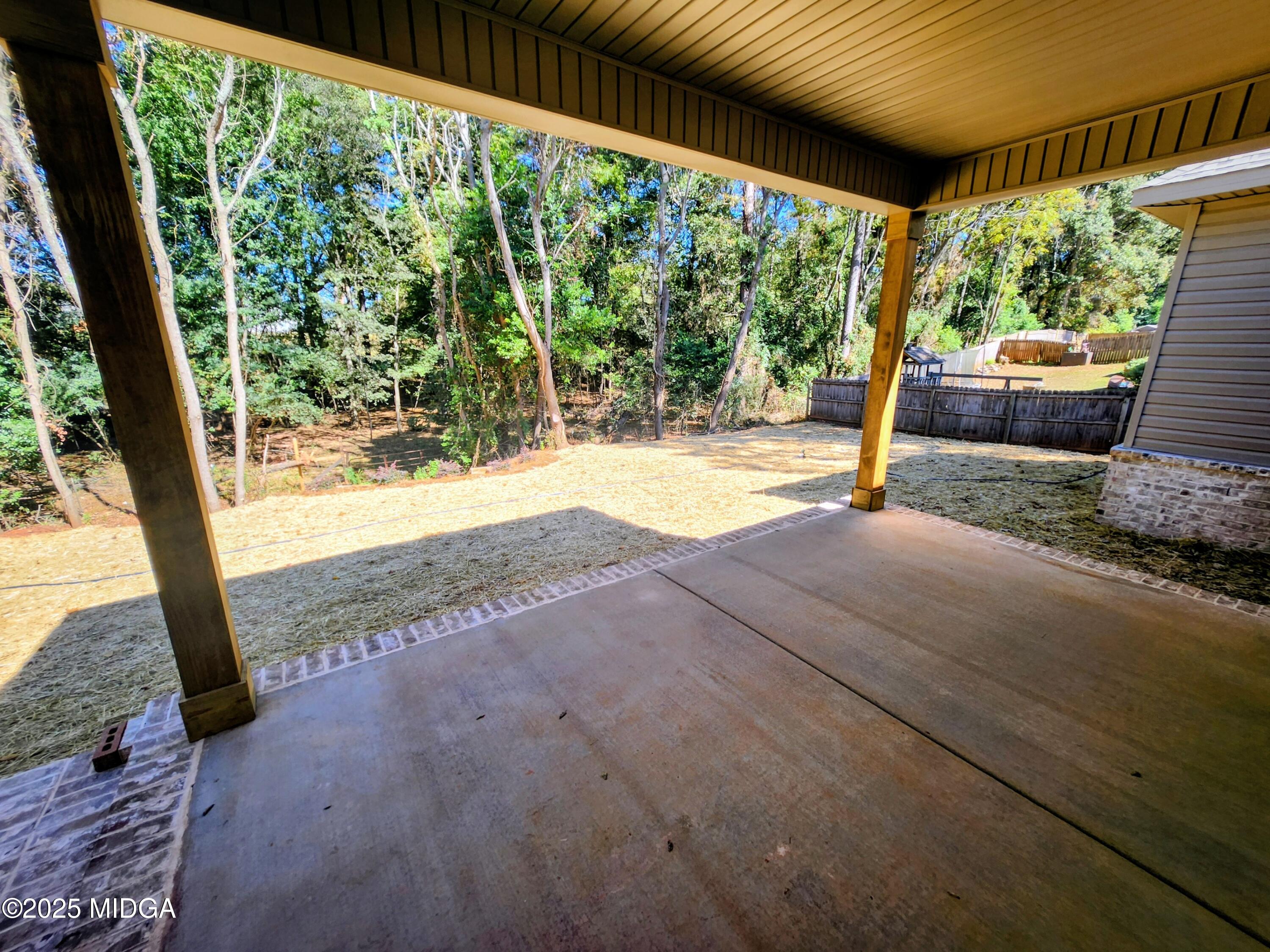 404 Minter Drive Warner Robins, GA 31088 - Photo 53 of 60 a backyard of a house with a fountain