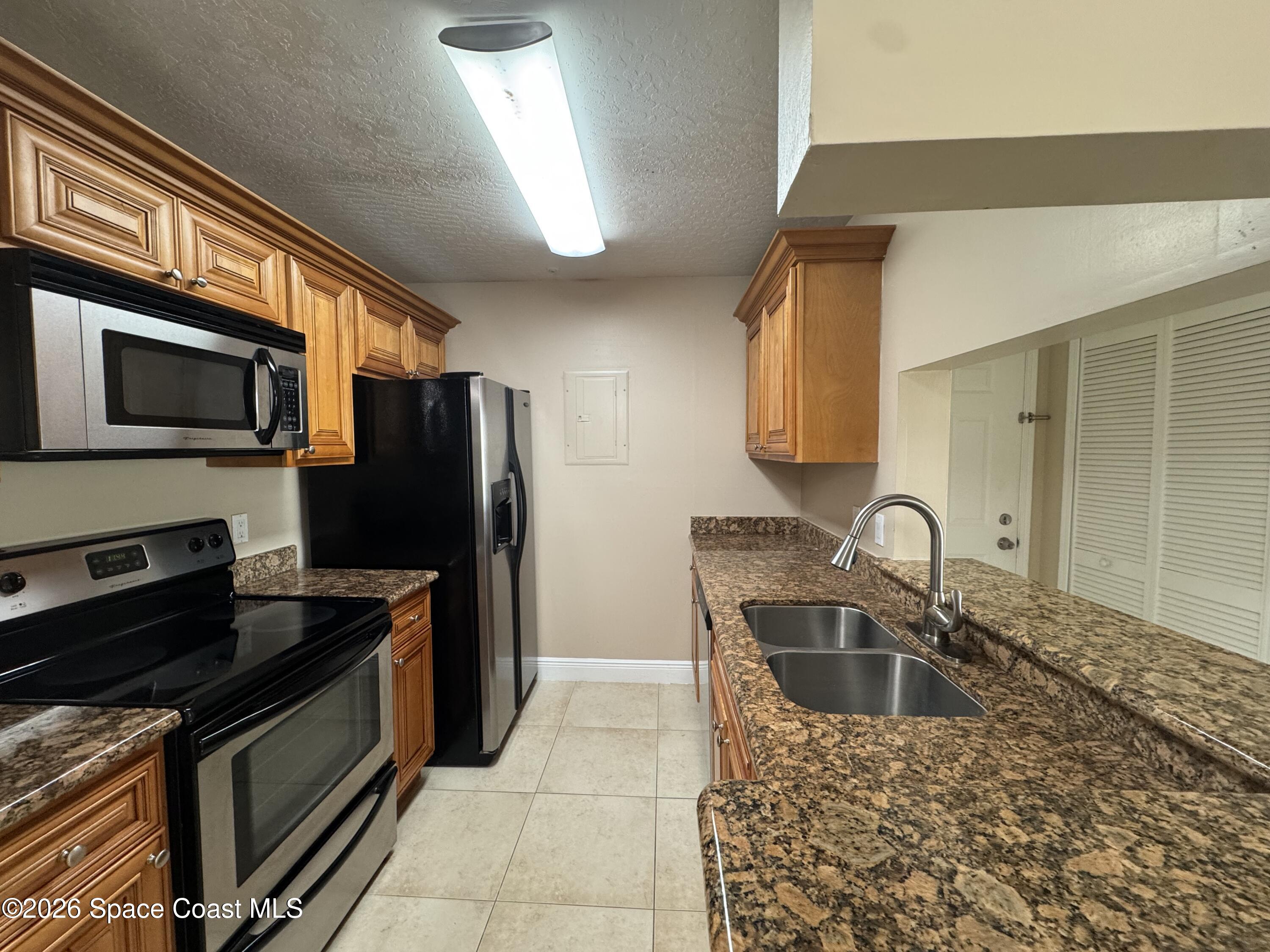 7667 North Wickham Road, Unit 416 Melbourne, FL 32940 - Photo 6 of 23 IMG_7214