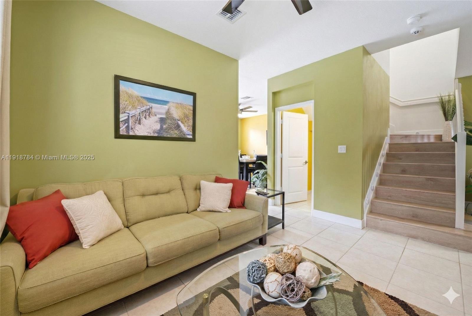 4501 Northwest 48th Terrace Tamarac, FL 33319 - Photo 4 of 18 Bright and cozy living room with space to relax, unwind, and entertain