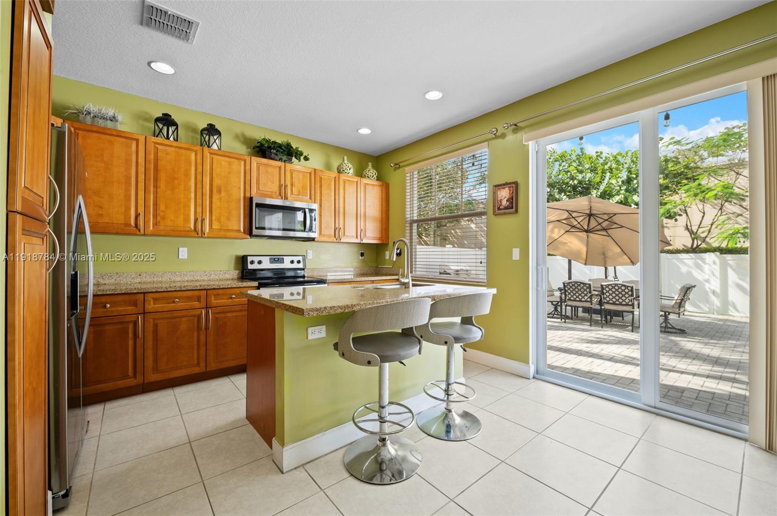 4501 Northwest 48th Terrace Tamarac, FL 33319 - Photo 5 of 18 Updated kitchen with tons of counter space—easy to cook, clean, and keep organized.