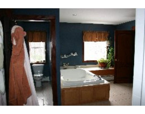 8 North County Road Princeton, MA 01541 - Photo 11 of 24 a bathroom with a bathtub and a sink