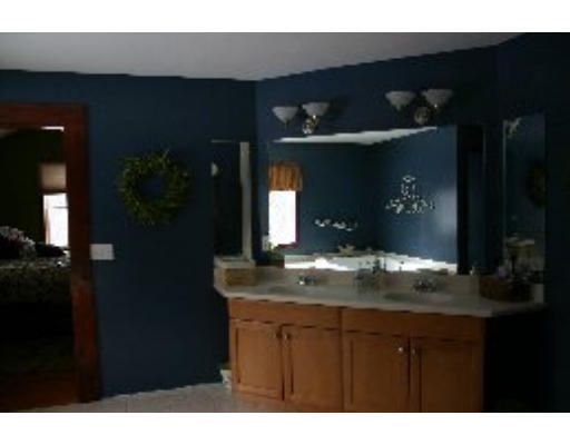 8 North County Road Princeton, MA 01541 - Photo 12 of 24 a bathroom with a sink and a mirror