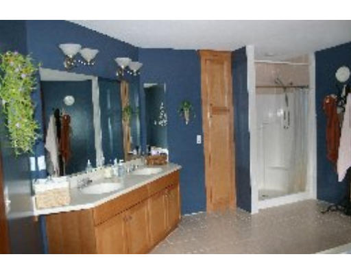 8 North County Road Princeton, MA 01541 - Photo 14 of 24 a bathroom with a sink and a mirror