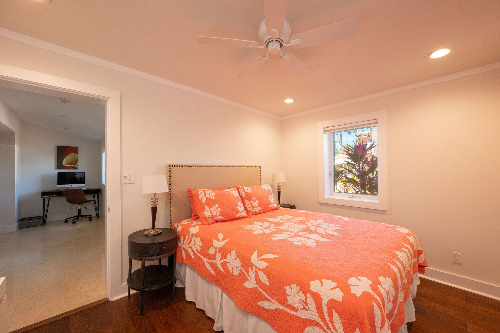 1422 Patricia Street Key West, FL 33040 - Photo 15 of 61 a bedroom with a large bed and a chandelier