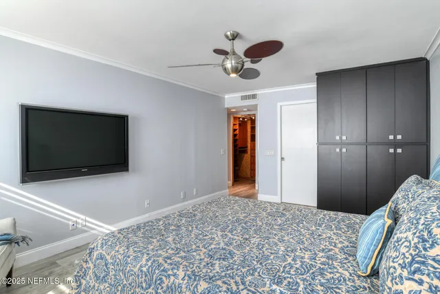 a bathroom with a double vanity sink mirror and shower
