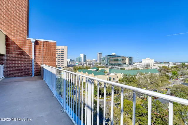 a bathroom with a toilet mirror and a sink