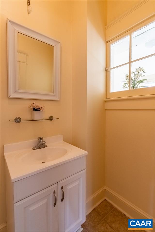 4308 Millington Road Free Union, VA 22940 - Photo 34 of 43 a bathroom with a sink a vanity and a mirror