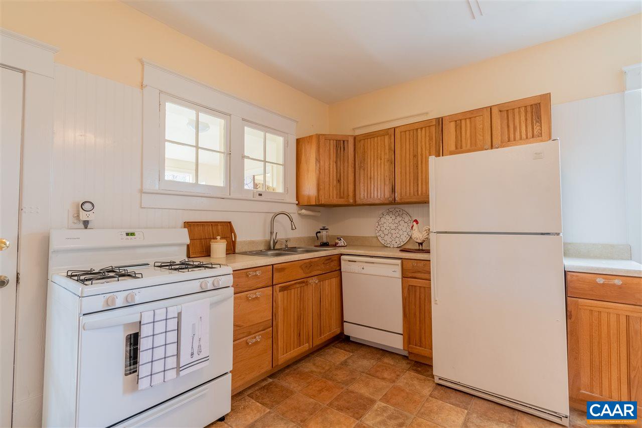 4308 Millington Road Free Union, VA 22940 - Photo 9 of 43 a kitchen with stainless steel appliances granite countertop a stove a refrigerator and a sink