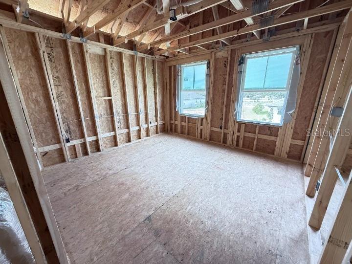 30150 Rustic Mill Street Mount Dora, FL 32757 - Photo 14 of 37 a view of an empty room with a window