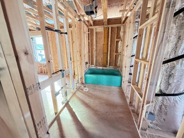 30150 Rustic Mill Street Mount Dora, FL 32757 - Photo 16 of 37 a view of an entryway with wooden floor and a livingroom