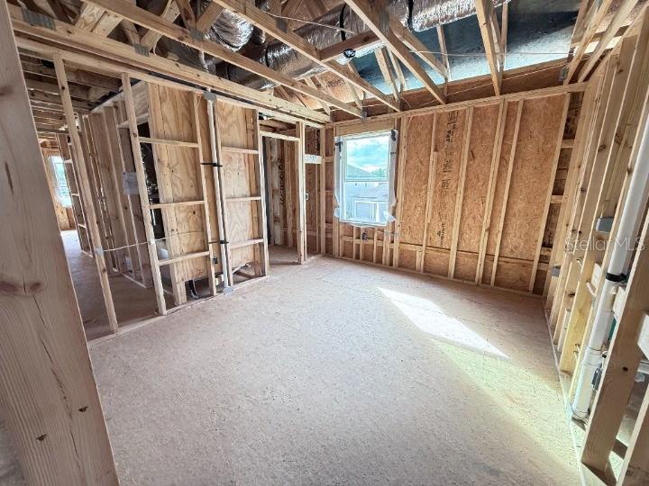 30150 Rustic Mill Street Mount Dora, FL 32757 - Photo 17 of 37 a view of empty room with wooden walls