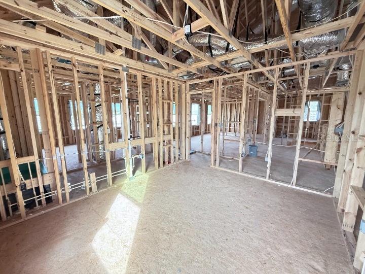 30150 Rustic Mill Street Mount Dora, FL 32757 - Photo 18 of 37 a view of an empty room with wooden frame