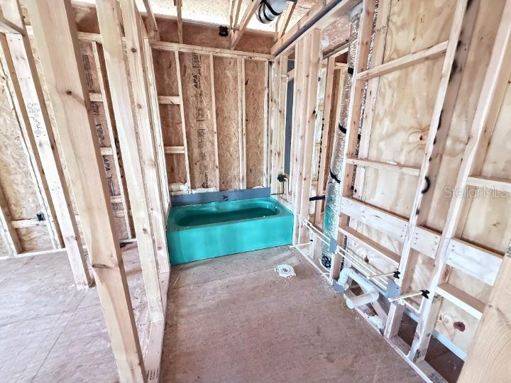 30150 Rustic Mill Street Mount Dora, FL 32757 - Photo 19 of 37 a view of an entryway with a garden