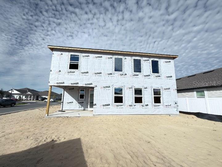 30150 Rustic Mill Street Mount Dora, FL 32757 - Photo 29 of 37 a view of house with yard