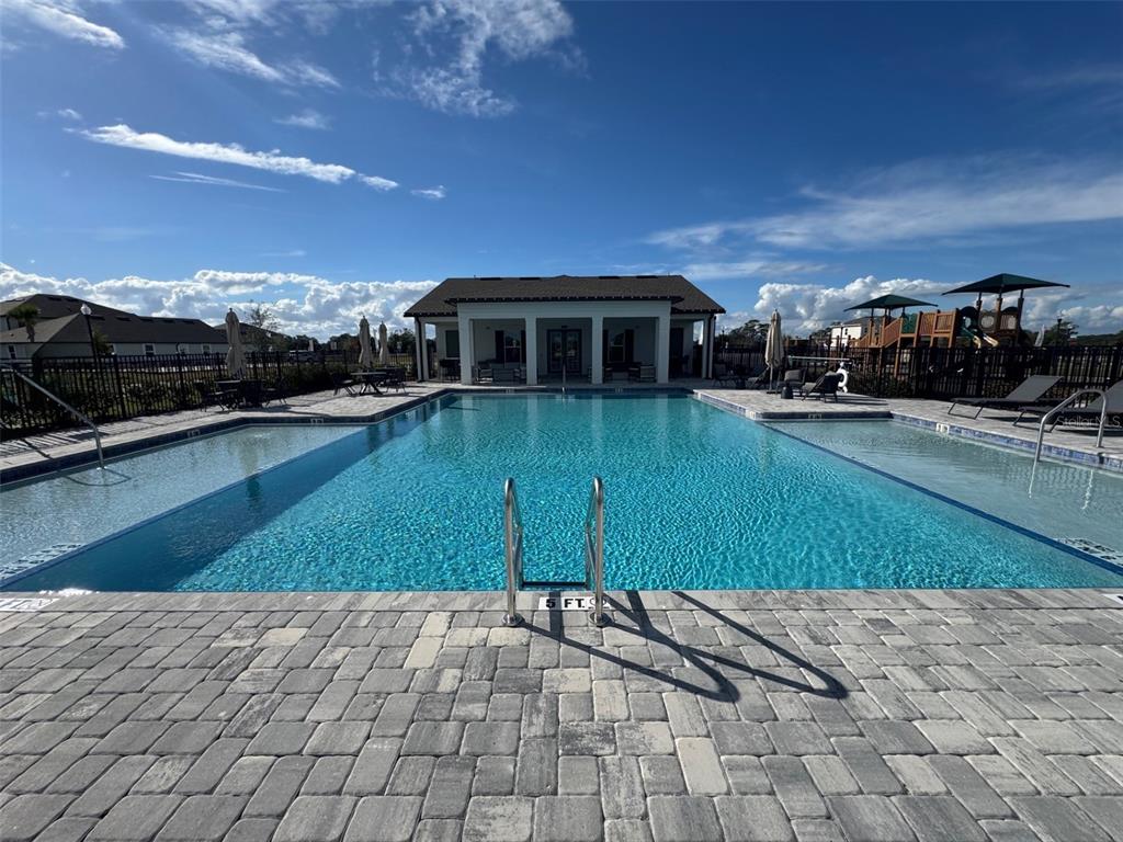 30150 Rustic Mill Street Mount Dora, FL 32757 - Photo 35 of 37 a view of a house with a yard