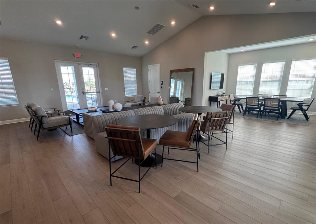30150 Rustic Mill Street Mount Dora, FL 32757 - Photo 36 of 37 a living room with furniture and wooden floor