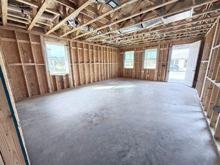 30150 Rustic Mill Street Mount Dora, FL 32757 - Photo 4 of 37 a view of a room with wooden walls