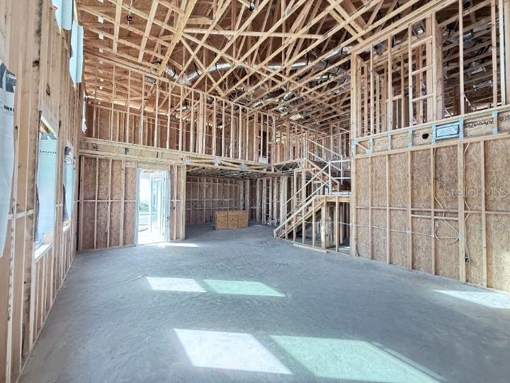30150 Rustic Mill Street Mount Dora, FL 32757 - Photo 5 of 37 a view of a porch with a floor to ceiling windows