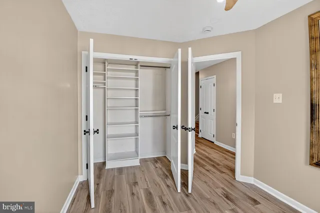 a view of entryway with wooden floor