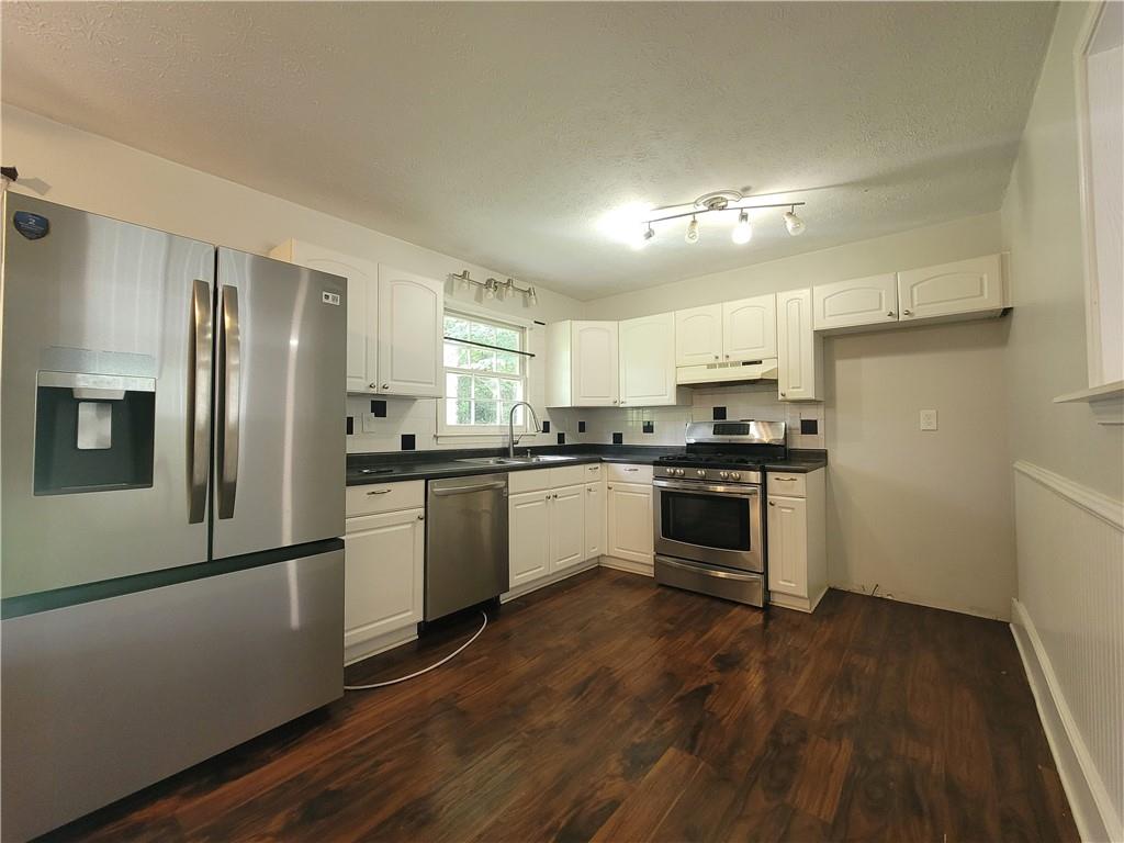 4641 Lucerne Valley Road Southwest Lilburn, GA 30047 - Photo 3 of 23 Gallery Image 3