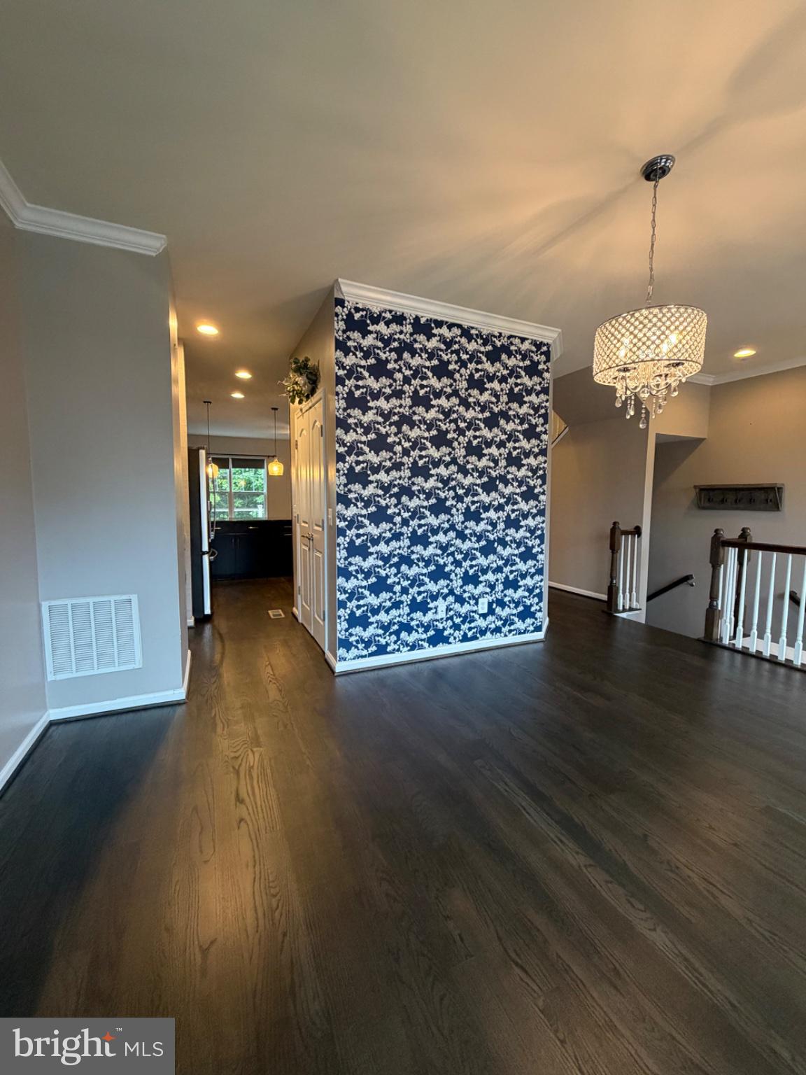 25333 Wakestone Terrace Chantilly, VA 20152 - Photo 34 of 109 Chic entryway with bold wallpaper.