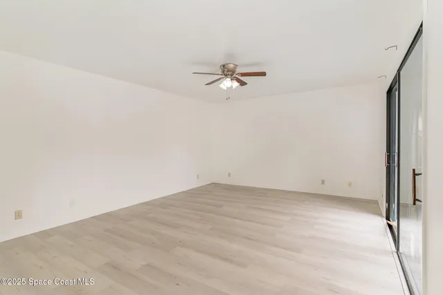 a view of a big room with carpet
