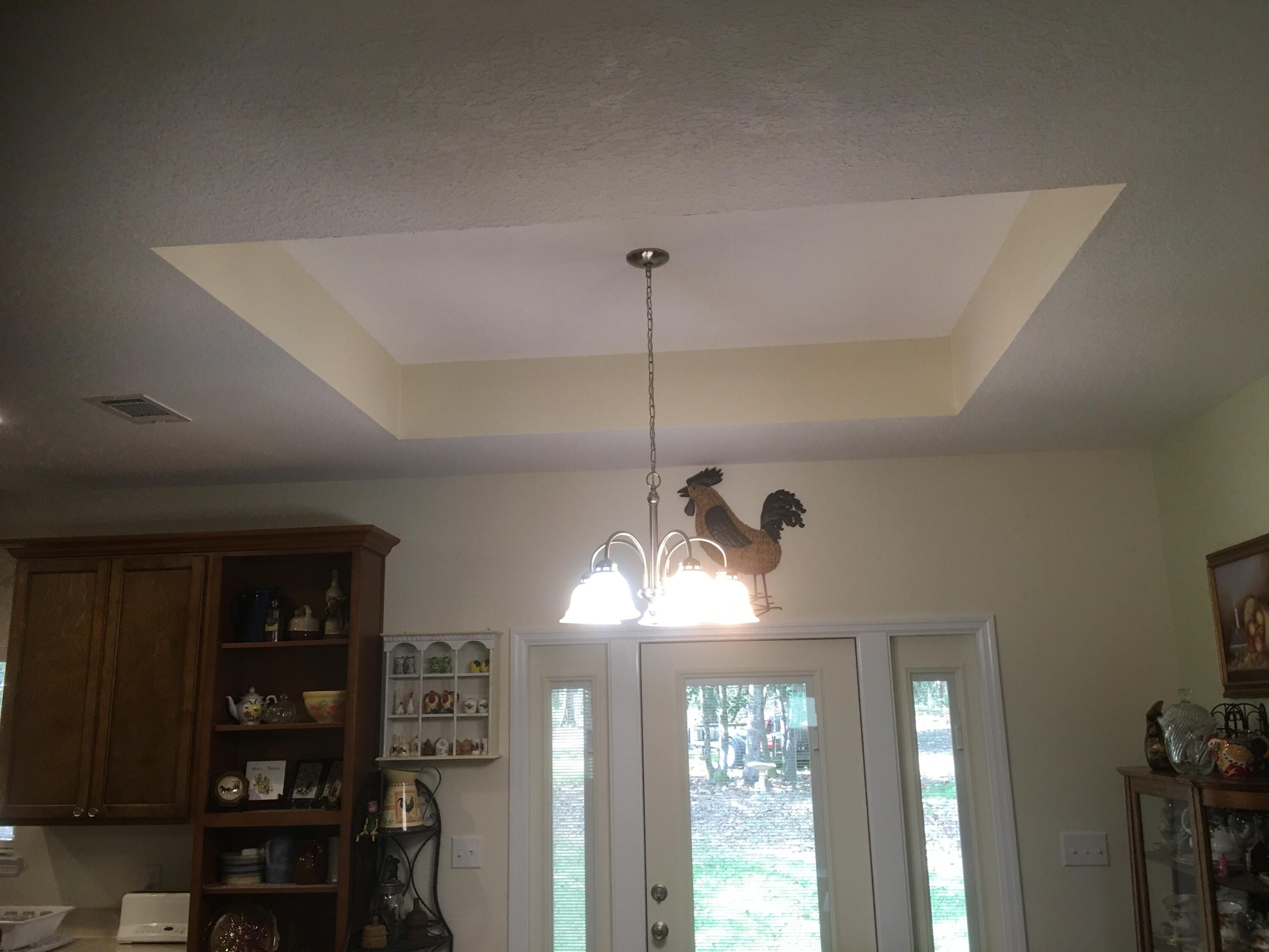 5872 Dairy Road Baker, FL 32531 - Photo 8 of 31 a view of a room with furniture and chandelier fan