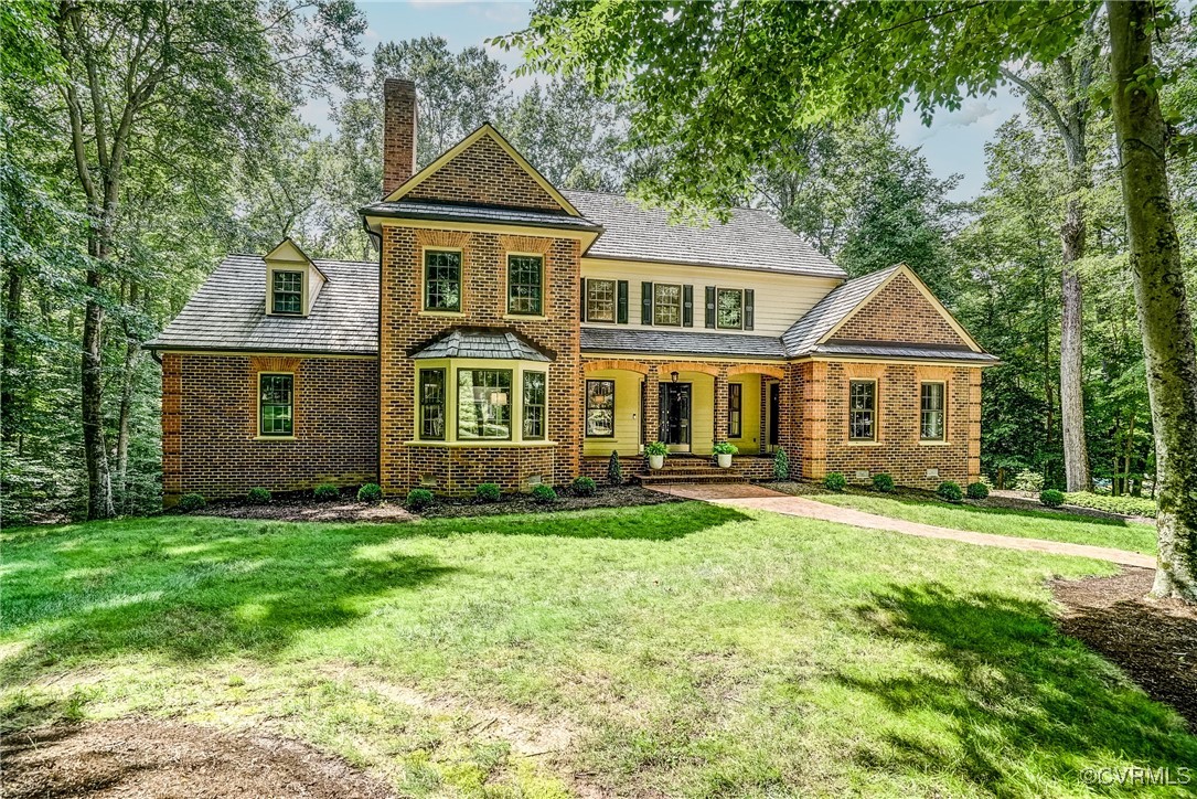 3630 Lansdowne Road Midlothian, VA 23113 - Photo 2 of 50 a front view of a house with a yard