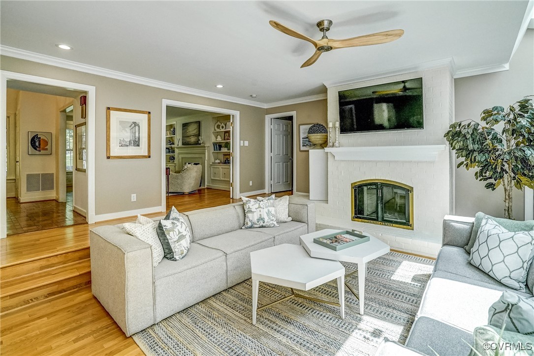 3630 Lansdowne Road Midlothian, VA 23113 - Photo 25 of 50 a living room with furniture and a fireplace