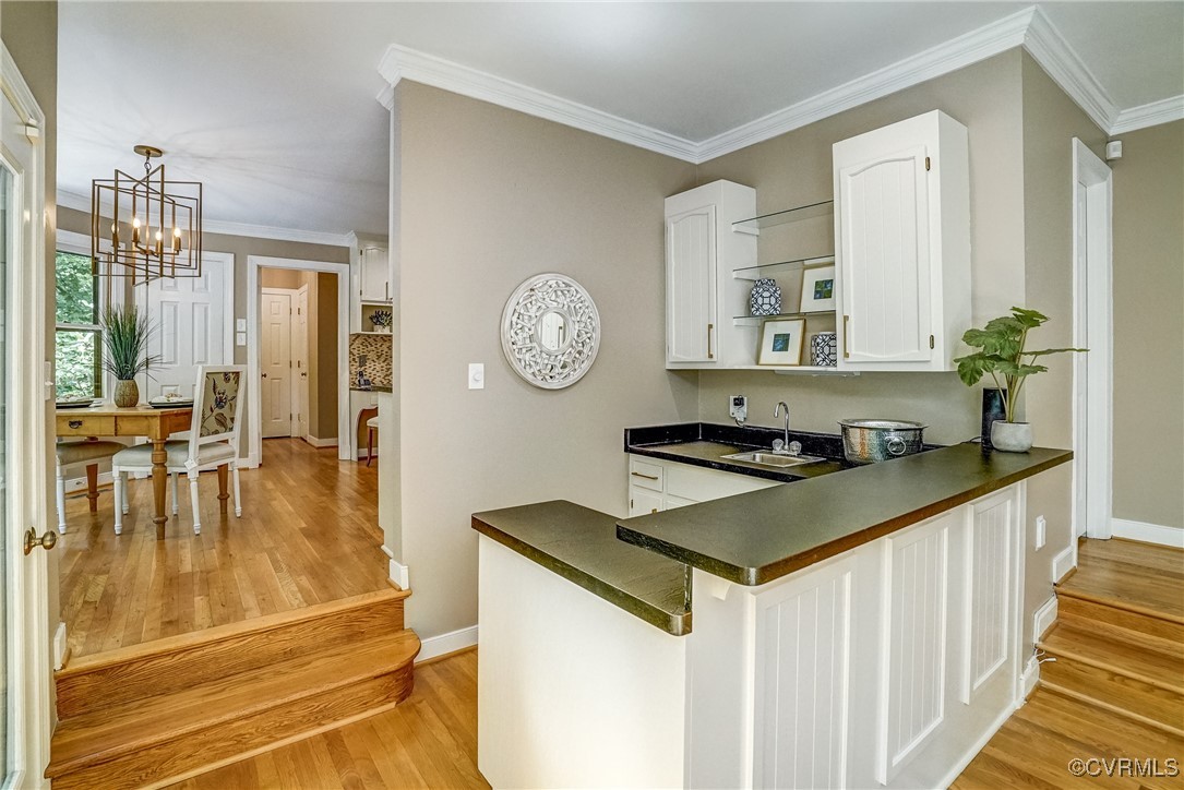 3630 Lansdowne Road Midlothian, VA 23113 - Photo 26 of 50 a kitchen with a sink and a stove top oven